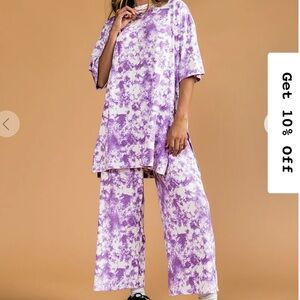 DRESSED IN LALA gently used ribbed playsuit in cosmic tie dye